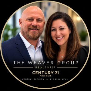 Jay and Christina Weaver of The Weaver Group at CENTURY 21 Alton Clark